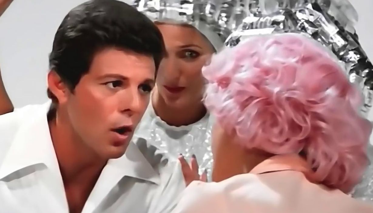 In the iconic 1978 flick "Grease," which legendary character delivers the high-glam track "Beauty School Dropout"?